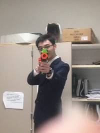 Francis Posing with a Nerf Gun at FBLA